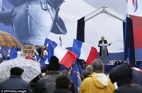 Topless Femen Protesters Making Nazi Salutes Disrupt Marine Le Pen