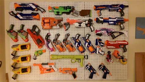 Nerf gun storage rare pokemon cards nerf party toy rooms playroom diy and crafts duck tape kids room guns. Pin on Charlie's room