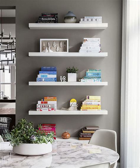 Floating White Shelves In The Dining Room Add Grace And Minimalist