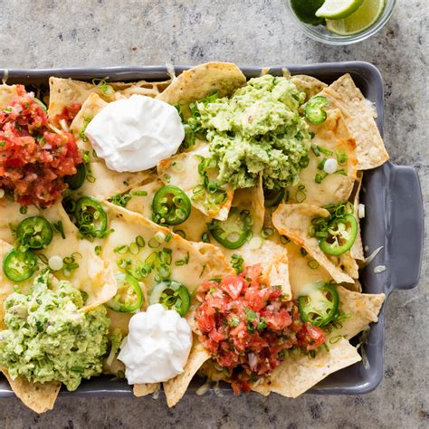 Cheesy Nachos With Guacamole And Salsa Americas Test Kitchen