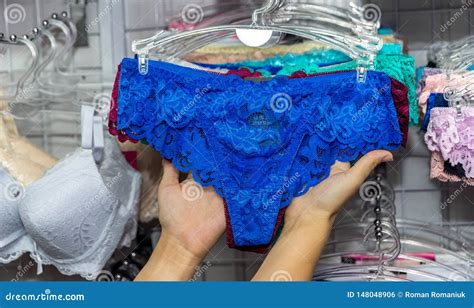 Female Hands With Panties In Underwear Shop Stock Photo Image Of Hanger Cloth