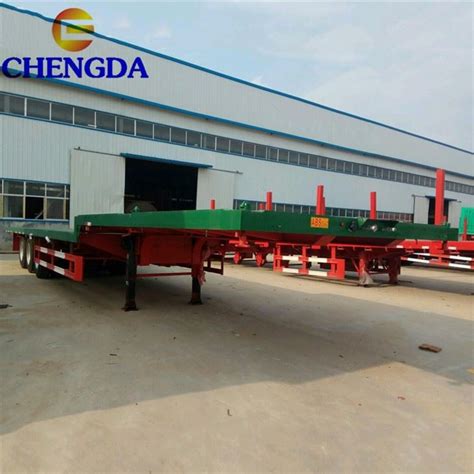 China 65 Ton Lowboy Trailer Manufacturers And Factory Price Sinotruck