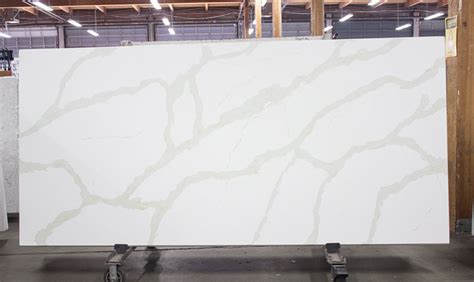 Calacatta Slab Pental Quartz White Italy 650x387 Fox Marble