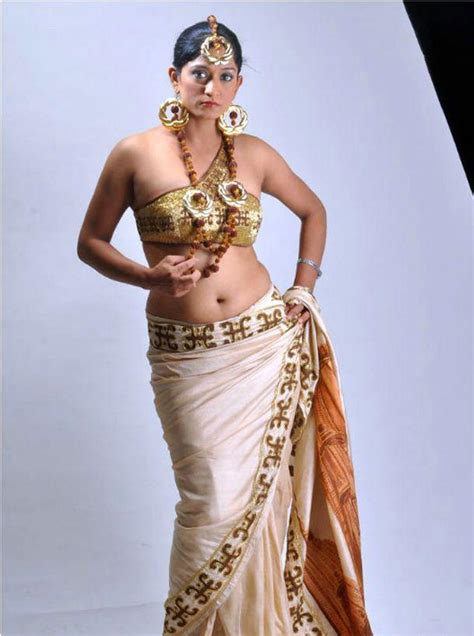 Model Varsha Hot Navel Show In Saree Latest Stills All Pics