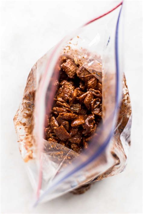 More chocolate, more peanut butter and more powdered sugar! chocolate coated chex cereal in a ziploc bag | Puppy chow ...