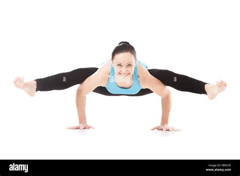 Smiling Sporty Yogi Girl Doing Fitness Exercises Handstand Yoga Asana Tittibhasana Arm