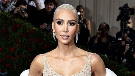 Kim Kardashian Shows Off Major Cleavage In Tight Top And Looks