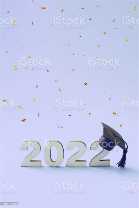 Graduation 2022 Wearing A Graduate Hat On A Wooden 2022 Number On A