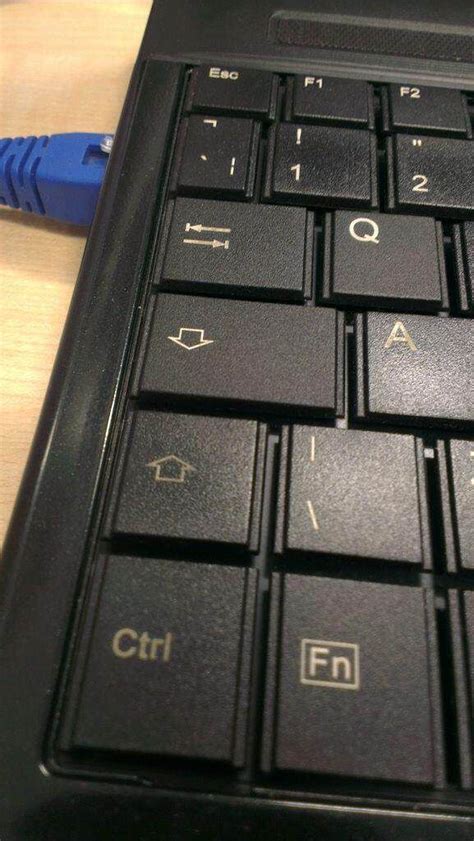 The Caps Lock Key On This Laptop Is A Downwards Pointing Arrow