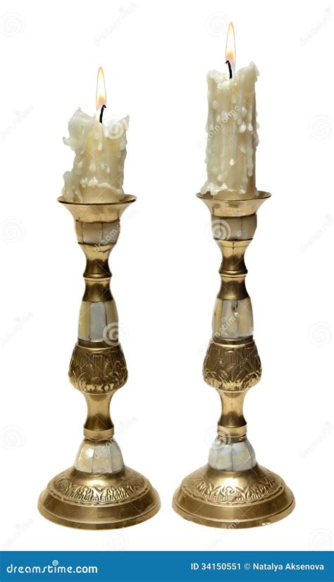 Two Burning Old Candles In Golden Candlesticks Stock Image Image