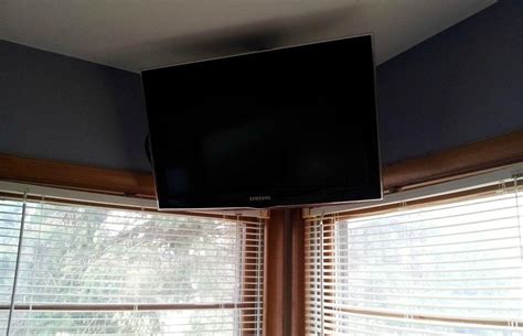 I'd recomment a metal frame behind the drop down ceiling part to avoid it warping on you. How to Build a Simple Flat Screen TV Ceiling Mount from ...