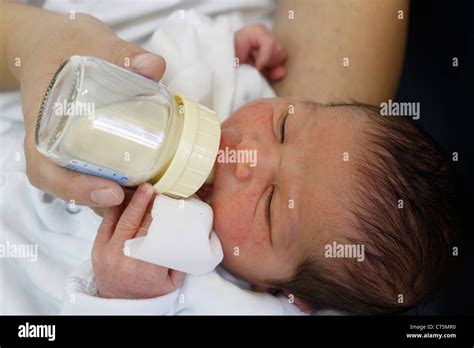 Newborn With Baby Bottle Stock Photo Alamy