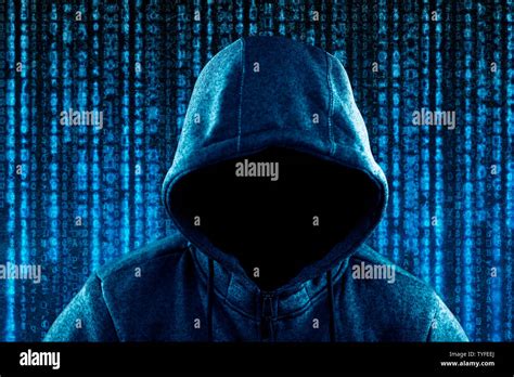 Anonymous Hooded Computer Hacker Portrait On Computer Code Background