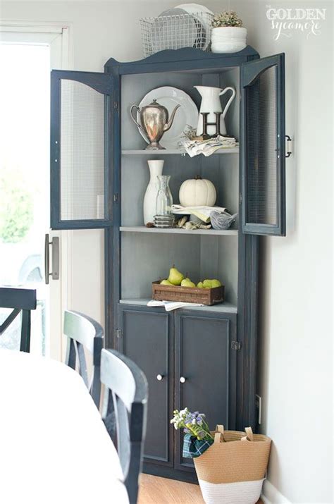 A dining room corner hutch is often used to store and display china in the top cabinet area and serving bowls in the bottom cabinet. Friday Favorites #4 | Dining room corner, Dining room ...