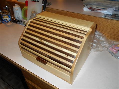 Here are 5 bread box plans for you to look at. Bread Box - by AKDave @ LumberJocks.com ~ woodworking community