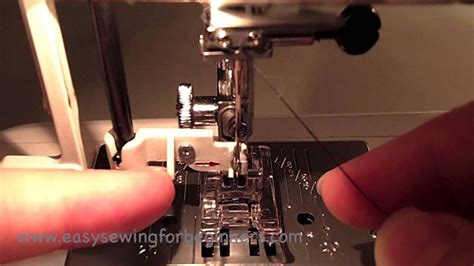 How To Use The Automatic Needle Threader On A Sewing Machine Youtube