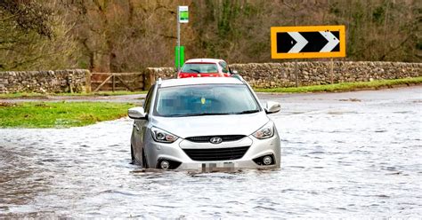 Live Flooding Traffic And Met Office Weather Verdict After Car Gets