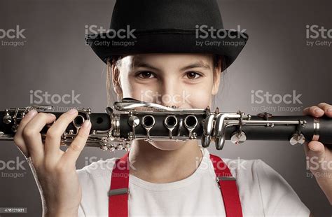 Little Girl Playing Clarinet Stock Photo Download Image Now