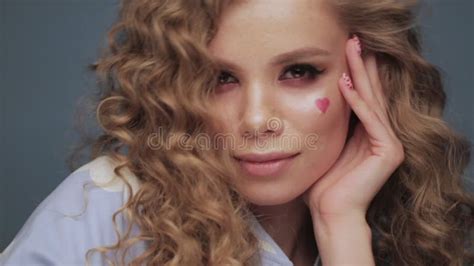 Pretty Girl With Curls Hairstyle Classic Makeup Freckles Nude Lips