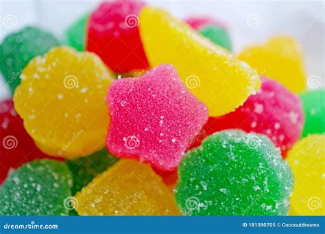 Closeup Vivid Pink Star Shaped Sugar Coated Jelly Candy On Candies Pile