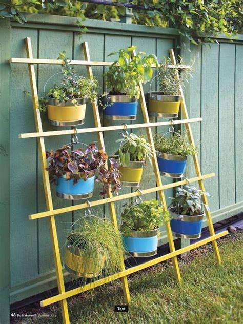 What A Great Idea For A Verticle Herb Garden Using A Trellis Buckets