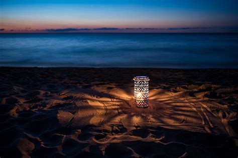 Lantern On The Beach At Sunset Stock Photo Download Image Now Istock