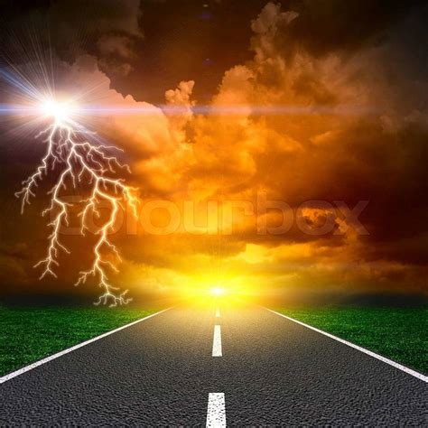 The Asphalt Road With Storm Lightning Stock Photo Colourbox