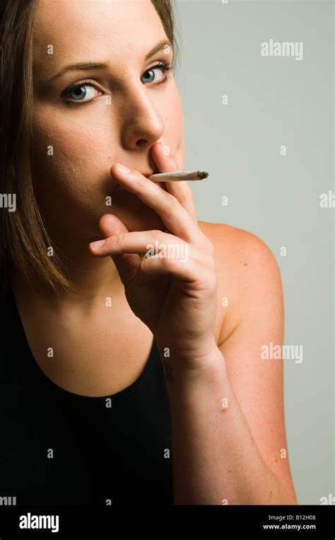 Nineteen Year Old Teenage Girl Smoking Hand Rolled Cigarette Uk Stock