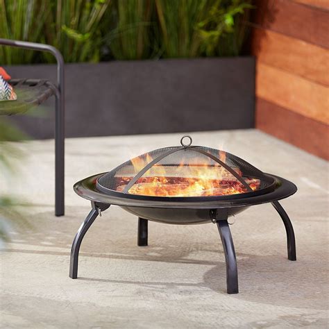 The fire pit that is perfect for a family camping trip! The Camping Fire Accessories Every Camper Needs | Fire pit ...