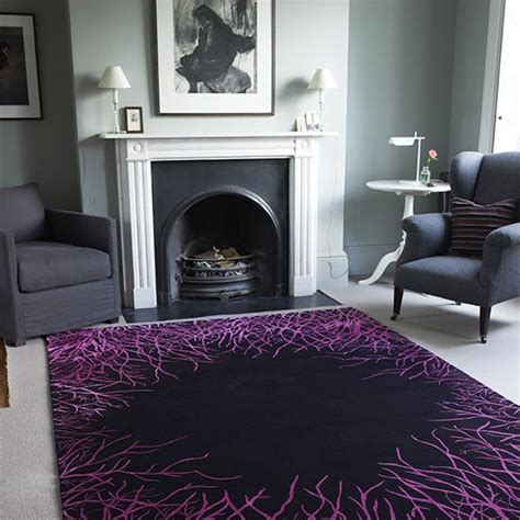 Striking Purple Rug Is A Bright Accent In An Otherwise Muted Living