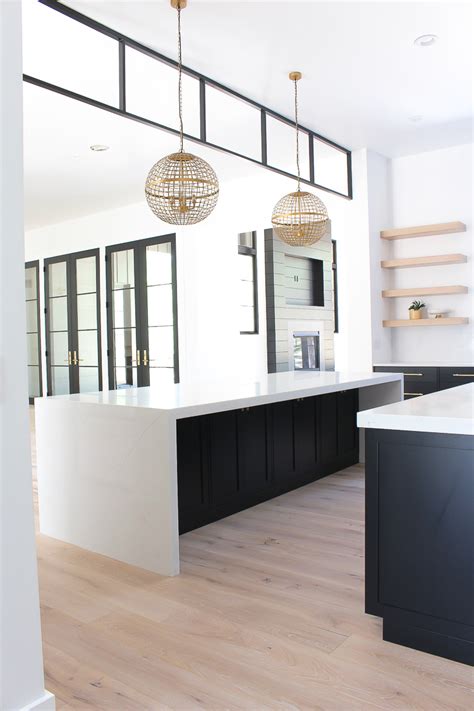 The floors and lower cabinets black, white above. Our New Modern Kitchen: The Big Reveal! - The House of ...