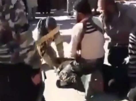 isis publicly behead man in syrian town square for insulting allah as he screams for help