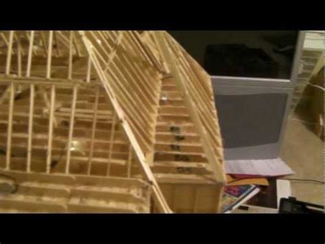 We started by making the frame of our house out of popsicle sticks. Popsicle Stick House Plans Free