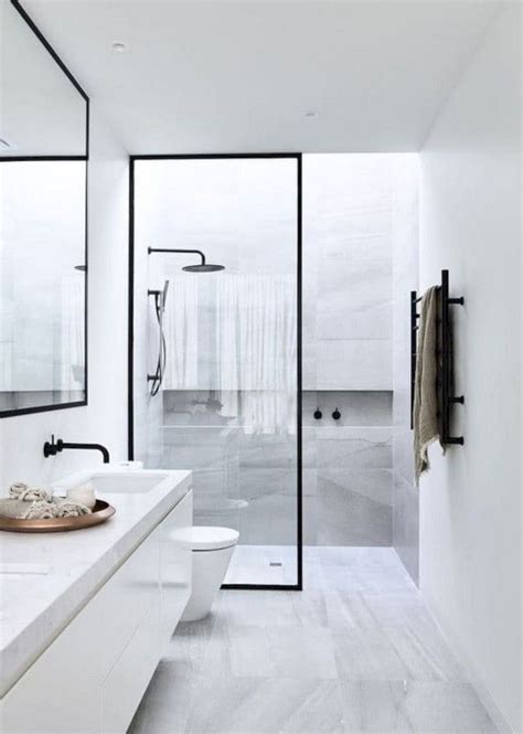 A frameless shower door, wainscotting, wallpaper, and beautiful tile add big style and makes the footprint look larger! 55 Beautiful Small Bathroom Ideas Remodel | Minimalist ...