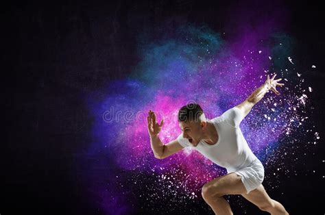 Portrait Of A Fitness Man Running On A Colourful Background Stock Image