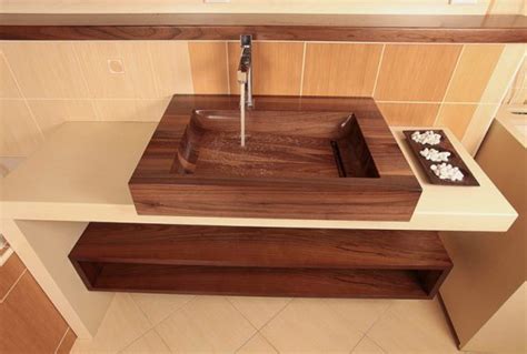 Wooden bathroom sink stands out magnificently in the bathroom and can easily transform sleek and cold bathroom into a modern natural interior. 20 Incredible wooden bathroom sinks