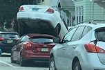 Driver bizarrely 'double parks' on top of car in New Jersey