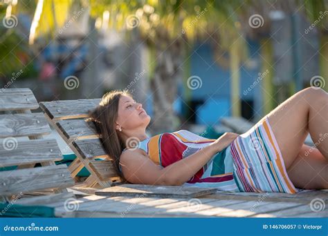 Pretty Young Woman Lying On The Beach Stock Image Image Of Happiness