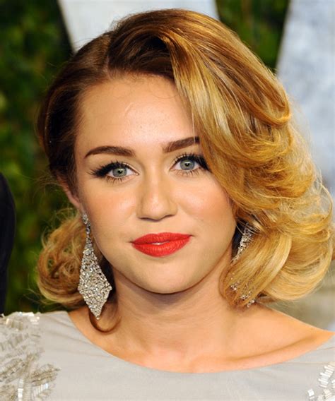 Miley Cyrus Medium Wavy Formal Hairstyle Golden Blonde Hair Color