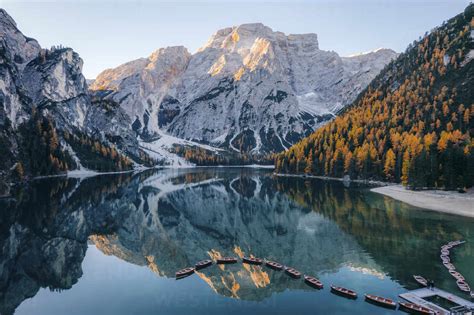 Aerial View Of Boats Anchored Along The Lago Di Braies Lake With