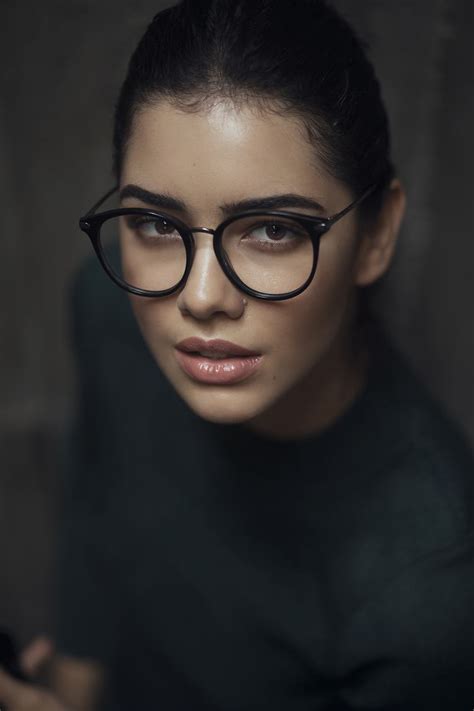 Free Photo Portrait Of Young Woman Wearing Retro Black Glasses