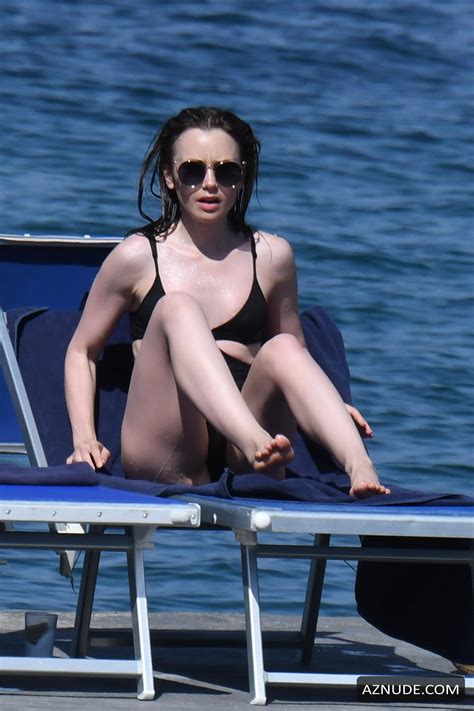 Lily Collins Sexy Wearing A Black One Piece Bathing Suit Aznude