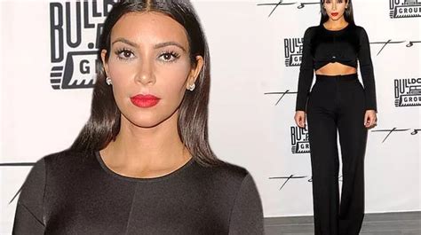 Kim Kardashian Flaunts Her Washboard Abs In Dramatic Crop Top At Dubai