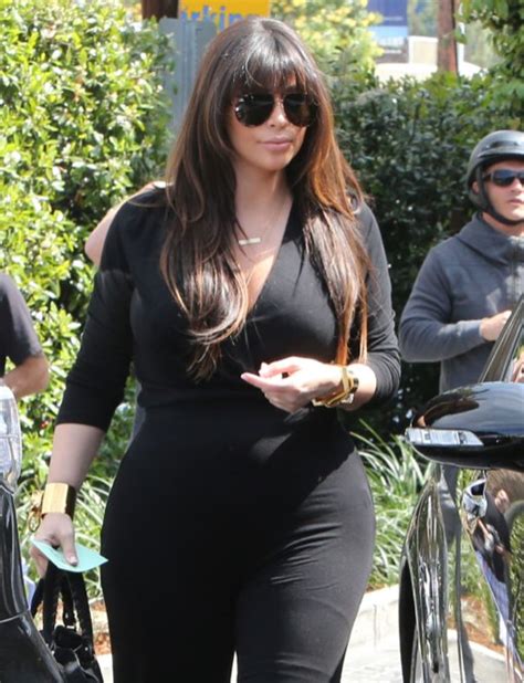 Kim Kardashian Proudly Shows Off Pregnancy Curves After Hitting Back At