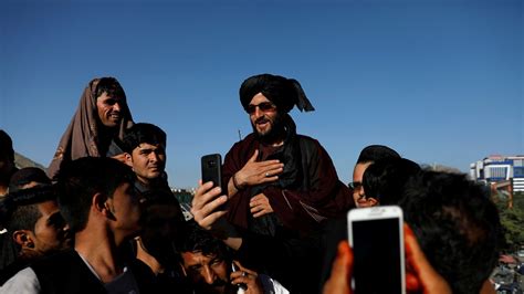 Taliban And Afghans Hug And Take Selfies During Unprecedented Ceasefire