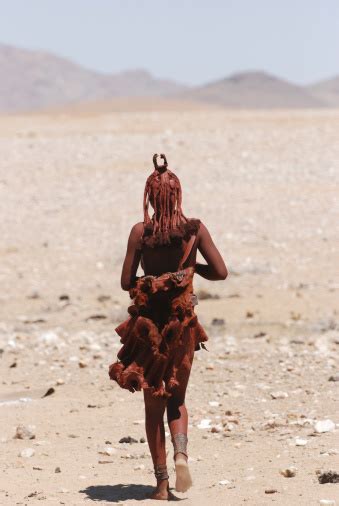 Lone Young Himba Woman Walking In Desert Namibia Stock Photo Download