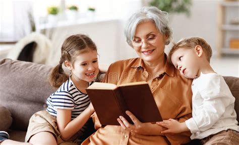 Grandmother Reading Book To Children Stock Photo Image Of Grandson