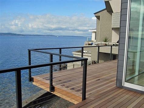 The entire system is completely code compliant. Cable railing ideas - cable deck railing and staircase design