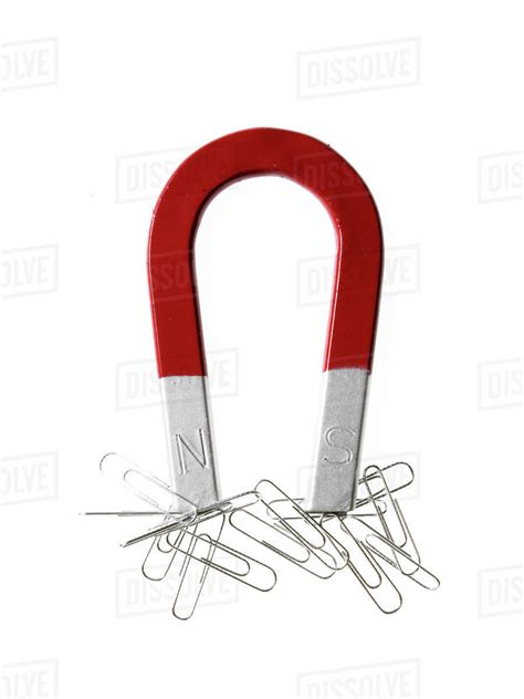 Magnet And Paper Clips Stock Photo Dissolve