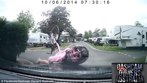 Moment Girl On Bike Crashes Head On Into Car But Is Saved By Her Pink